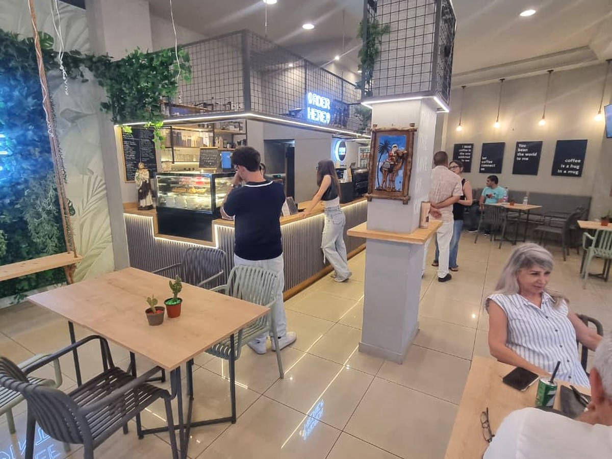 Guests ordering at the Cupsy Coffee counter
