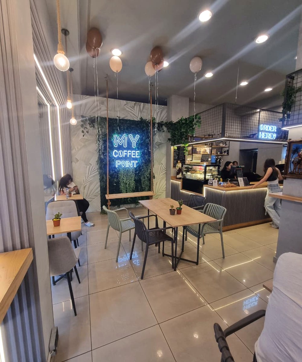 Pastry display and espresso bar at Cupsy Coffee